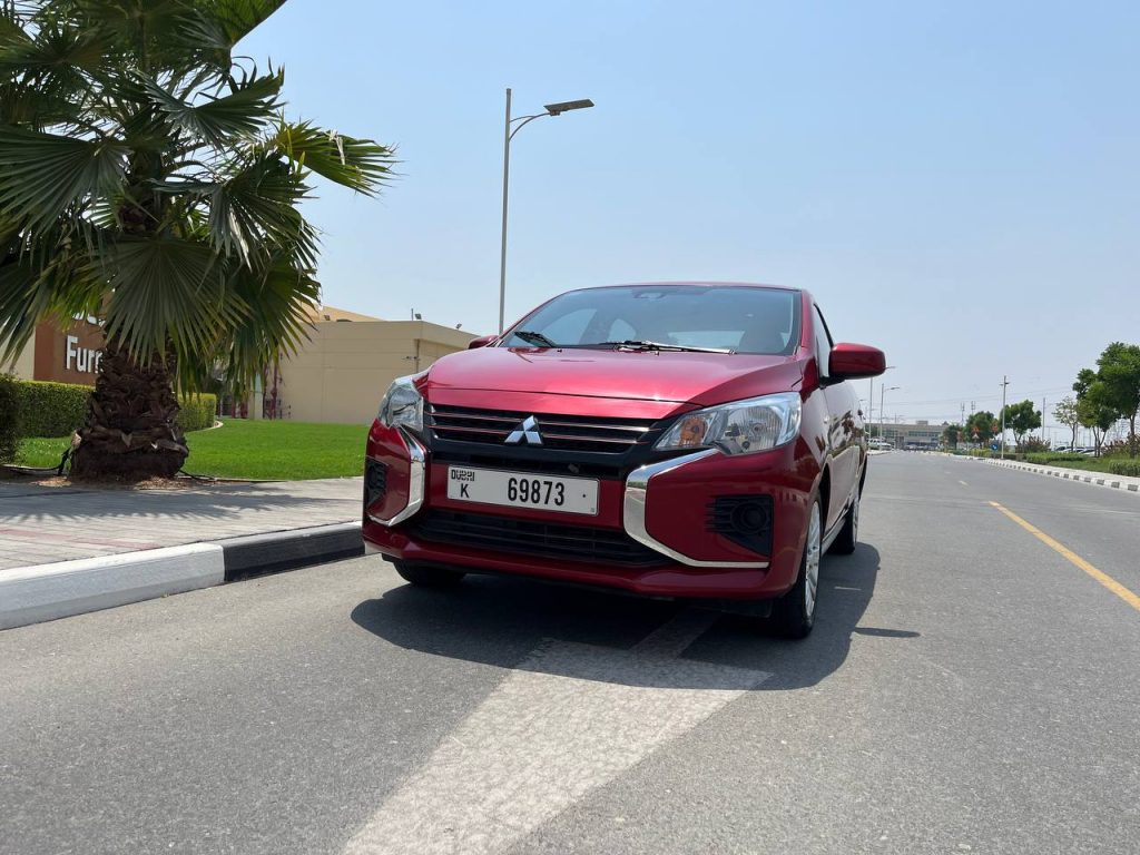 Арендовать mitsubishi attrage красный в Дубае